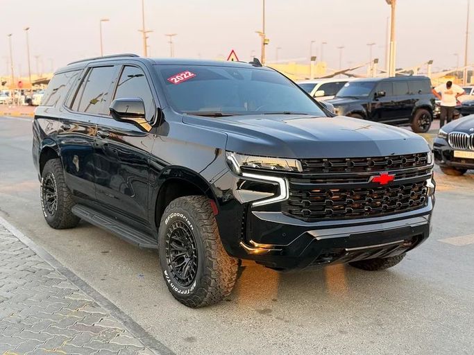 Подержанный Chevrolet Tahoe V, 6.2 л, 2022 в Шардже от Taj Al Impratoor Used Cars Черный цвет. GCC | AUTO.AE
