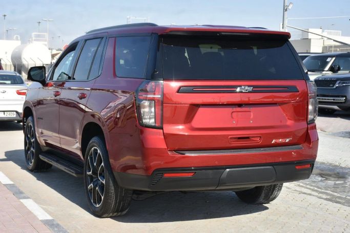 Подержанный Chevrolet Tahoe V Рестайлинг, 5.3 л, 2024 в Шардже от Alfaris Used Cars Красный цвет. Other | AUTO.AE