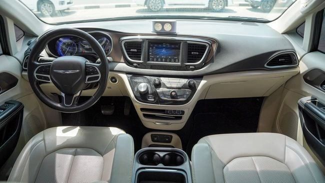 Used Chrysler Voyager VI, 3.6 l, 2023 in Sharjah by Alnujoom Al Malakiah Used Cars, Grey color. Canadian Specs | AUTO.AE