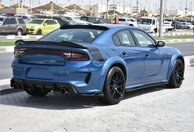 Подержанный Dodge Challenger III Рестайлинг 2, 3.6 л, 2023 в Шардже от Alfaris Used Cars Синий цвет. Other | AUTO.AE