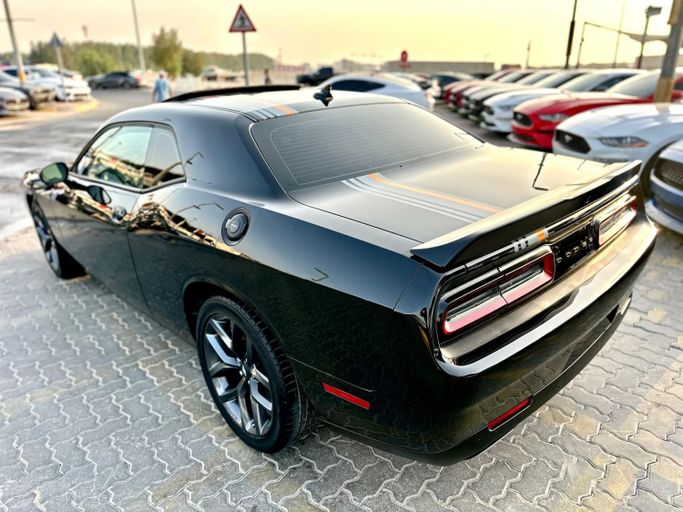 Подержанный Dodge Challenger GT III Рестайлинг 2, 3.6 л, 2022 в Шардже от Kandy Cars Черный цвет. Американская | AUTO.AE