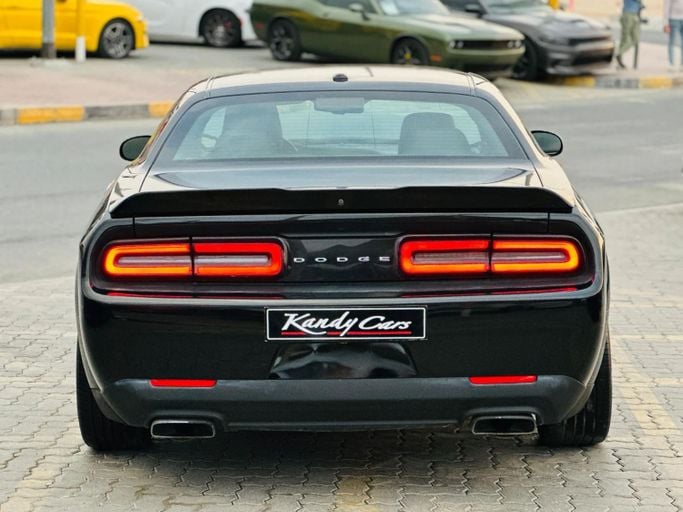 Подержанный Dodge Challenger R_T III Рестайлинг 2, 5.7 л, 2021 в Шардже от Kandy Cars Черный цвет. Американская | AUTO.AE