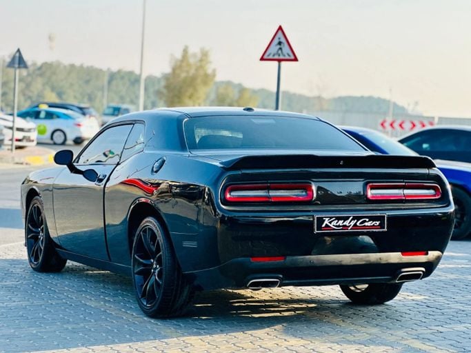 Подержанный Dodge Challenger GT III Рестайлинг 2, 3.6 л, 2021 в Шардже от Kandy Cars Черный цвет. Американская | AUTO.AE