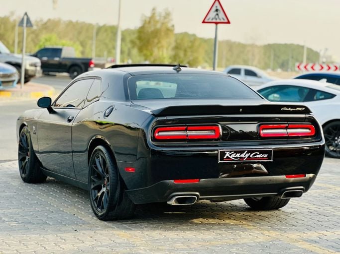 Подержанный Dodge Challenger R_T III Рестайлинг 2, 5.7 л, 2020 в Шардже от Kandy Cars Черный цвет. Американская | AUTO.AE