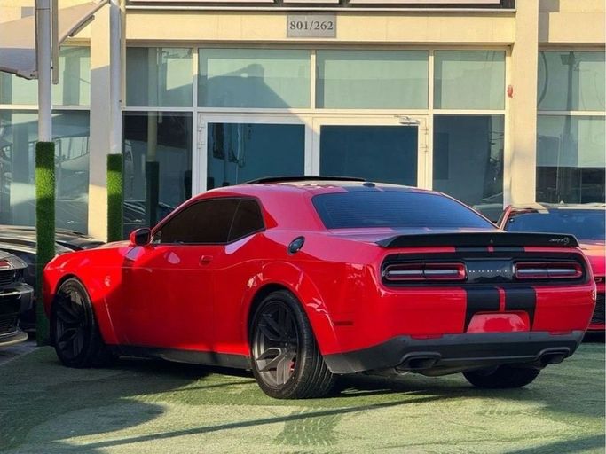 Used Dodge Challenger Hellcat III Facelift 2, 6.2 l, 2019 in Sharjah by Noor Al Seyoh Used Cars, Red color. GCC Specs | AUTO.AE