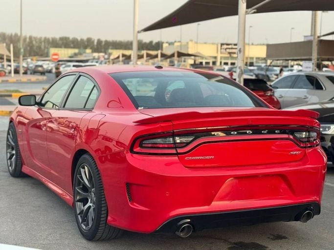 Подержанный Dodge Charger SRT VII (LD) Рестайлинг, 6.4 л, 2016 в Шардже от Nour Alnukhba Motors Красный цвет. GCC | AUTO.AE