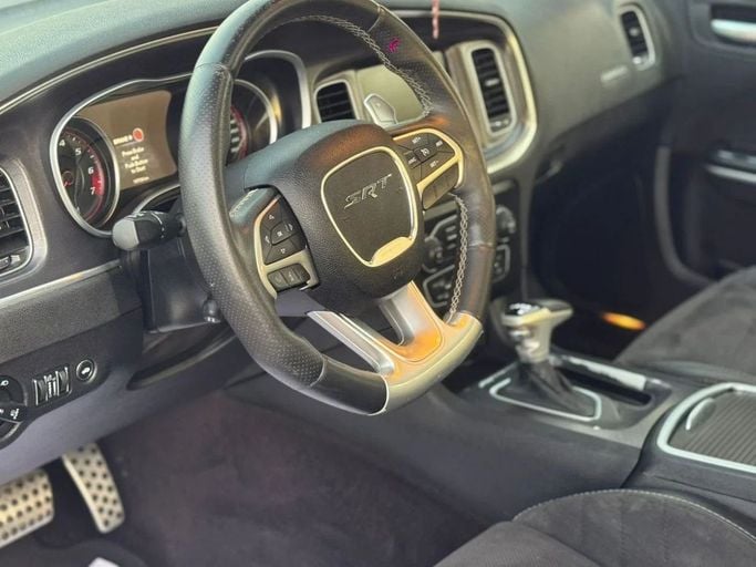 Подержанный Dodge Charger SRT VII (LD) Рестайлинг, 6.4 л, 2016 в Шардже от Nour Alnukhba Motors Красный цвет. GCC | AUTO.AE