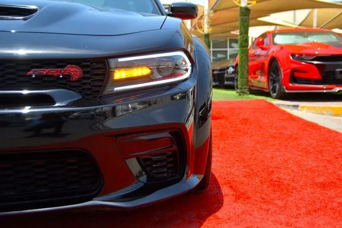 Used Dodge Charger VII (LD) Facelift, 3.6 l, 2022 in Sharjah by Wadishee Used Cars, Black color. American Specs | AUTO.AE