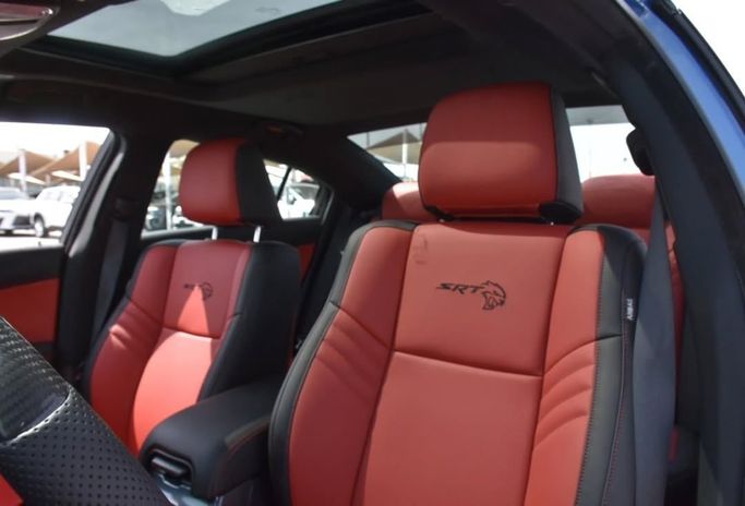 Подержанный Dodge Charger Hellcat VII (LD) Рестайлинг, 6.2 л, 2023 в Шардже от Alfaris Used Cars Синий цвет.  | AUTO.AE
