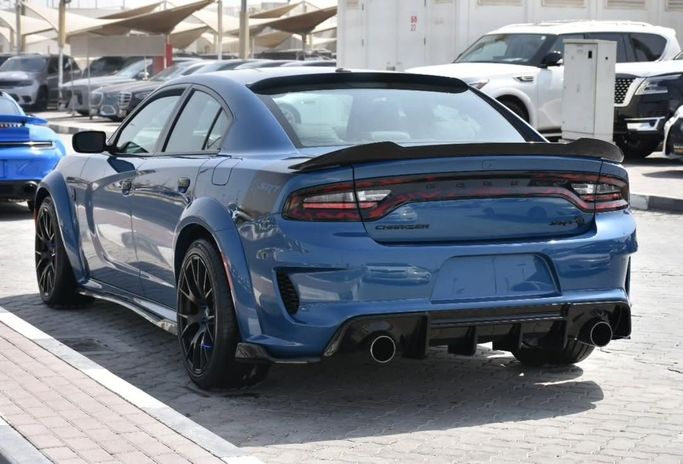 Подержанный Dodge Charger Hellcat VII (LD) Рестайлинг, 6.2 л, 2023 в Шардже от Alfaris Used Cars Синий цвет.  | AUTO.AE