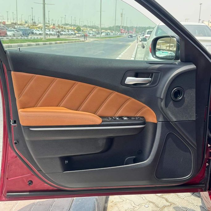 Used Dodge Charger VII (LD) Facelift, 3.6 l, 2023 in Sharjah by Alfaris Used Cars, Red color. Other | AUTO.AE