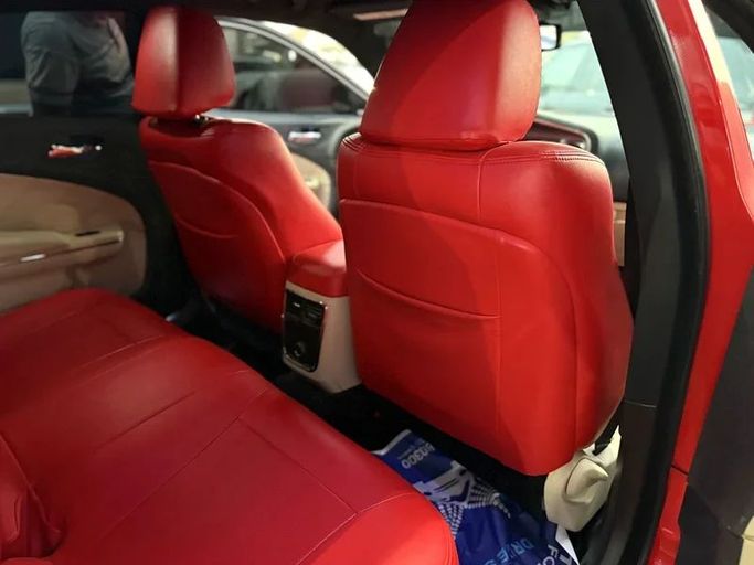 Подержанный Dodge Charger R_T VII (LD), 5.7 л, 2014 в Шардже от Al Muhtaref Used Cars Красный цвет. Американская | AUTO.AE