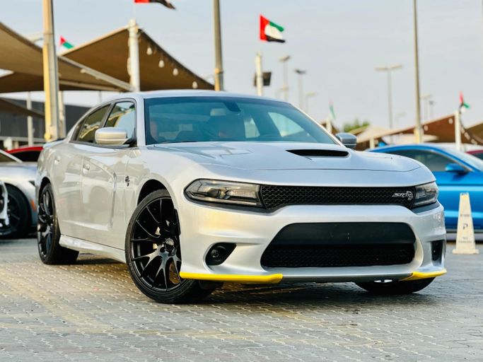 Подержанный Dodge Charger R_T VII (LD) Рестайлинг, 5.7 л, 2021 в Шардже от Kandy Cars Серебристый цвет. Американская | AUTO.AE