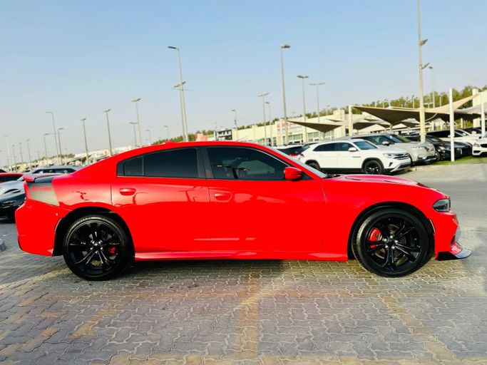 Подержанный Dodge Charger R_T VII (LD) Рестайлинг, 5.7 л, 2020 в Шардже от Kandy Cars Красный цвет. Американская | AUTO.AE