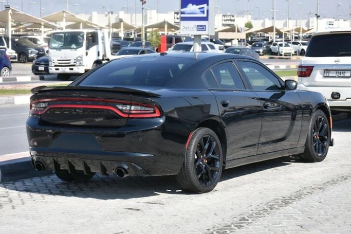 Подержанный Dodge Charger SXT VII (LD) Рестайлинг, 3.6 л, 2020 в Шардже от Alfaris Used Cars Черный цвет. Other | AUTO.AE
