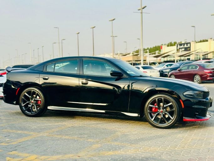 Подержанный Dodge Charger SXT VII (LD) Рестайлинг, 3.6 л, 2022 в Шардже от Kandy Cars Черный цвет. Американская | AUTO.AE