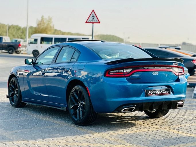 Подержанный Dodge Charger SXT VII (LD) Рестайлинг, 3.6 л, 2022 в Шардже от Kandy Cars Голубой цвет. Американская | AUTO.AE
