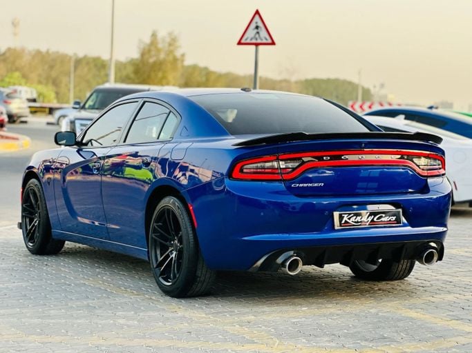 Подержанный Dodge Charger SXT VII (LD) Рестайлинг, 3.6 л, 2021 в Шардже от Kandy Cars Тёмно-синий цвет. Американская | AUTO.AE