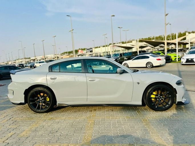 Подержанный Dodge Charger SXT VII (LD) Рестайлинг, 3.6 л, 2021 в Шардже от Kandy Cars Серый цвет. Американская | AUTO.AE