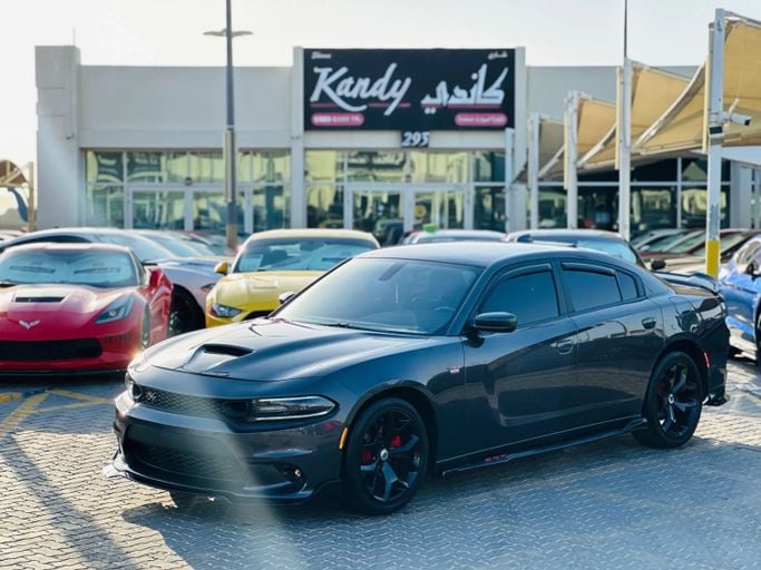 Подержанный Dodge Charger R_T VII (LD) Рестайлинг, 5.7 л, 2018 в Шардже от Kandy Cars Черный цвет. Американская | AUTO.AE