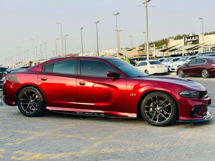 Подержанный Dodge Charger SRT VII (LD) Рестайлинг, 6.4 л, 2020 в Шардже от Kandy Cars Бордовый цвет. Американская | AUTO.AE