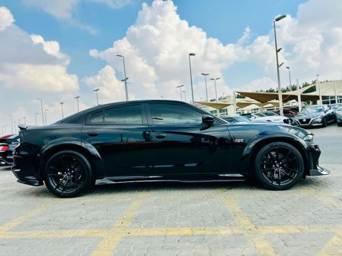 Подержанный Dodge Charger SRT VII (LD) Рестайлинг, 6.4 л, 2021 в Шардже от Kandy Cars Черный цвет. Американская | AUTO.AE