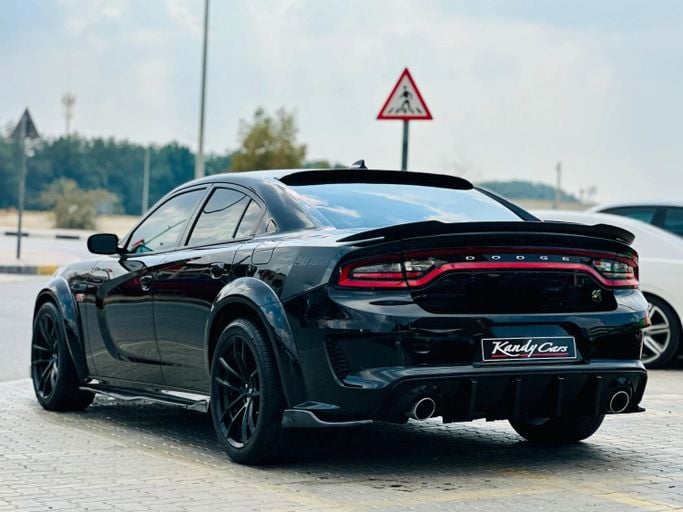 Подержанный Dodge Charger SRT VII (LD) Рестайлинг, 6.4 л, 2021 в Шардже от Kandy Cars Черный цвет. Американская | AUTO.AE