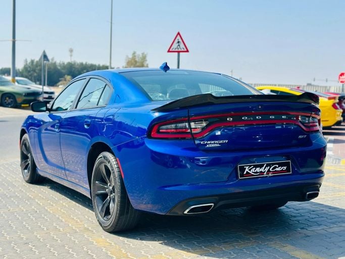 Подержанный Dodge Charger SXT VII (LD) Рестайлинг, 3.6 л, 2018 в Шардже от Kandy Cars Синий цвет. Американская | AUTO.AE