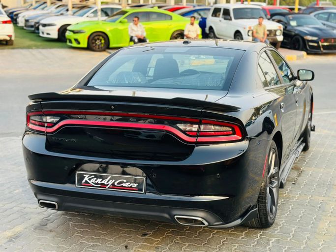 Подержанный Dodge Charger SXT VII (LD) Рестайлинг, 3.6 л, 2020 в Шардже от Kandy Cars Черный цвет. Американская | AUTO.AE