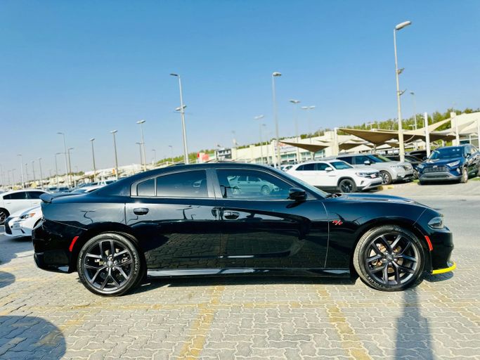 Подержанный Dodge Charger SRT VII (LD) Рестайлинг, 6.4 л, 2022 в Шардже от Kandy Cars Черный цвет. Американская | AUTO.AE
