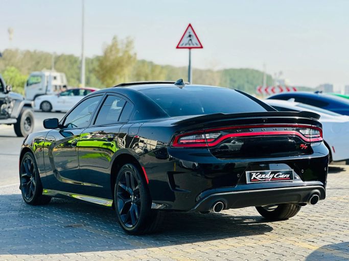 Подержанный Dodge Charger SRT VII (LD) Рестайлинг, 6.4 л, 2022 в Шардже от Kandy Cars Черный цвет. Американская | AUTO.AE