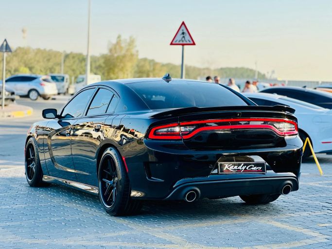 Подержанный Dodge Charger R_T VII (LD) Рестайлинг, 5.7 л, 2022 в Шардже от Kandy Cars Черный цвет. Американская | AUTO.AE