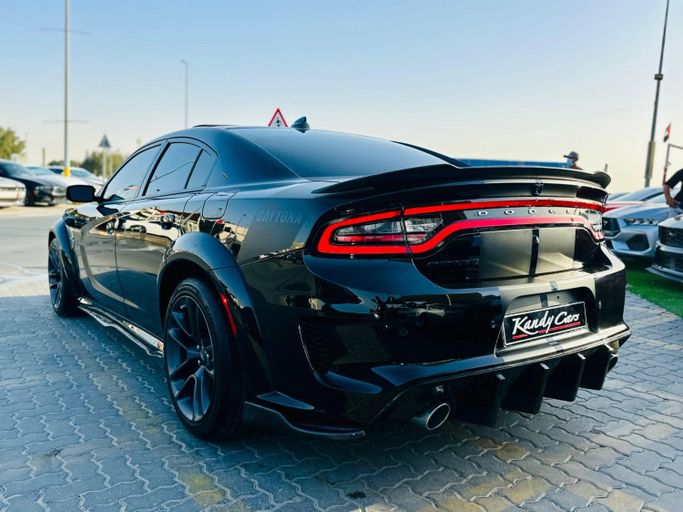 Подержанный Dodge Charger R_T VII (LD) Рестайлинг, 5.7 л, 2022 в Шардже от Kandy Cars Черный цвет. Американская | AUTO.AE