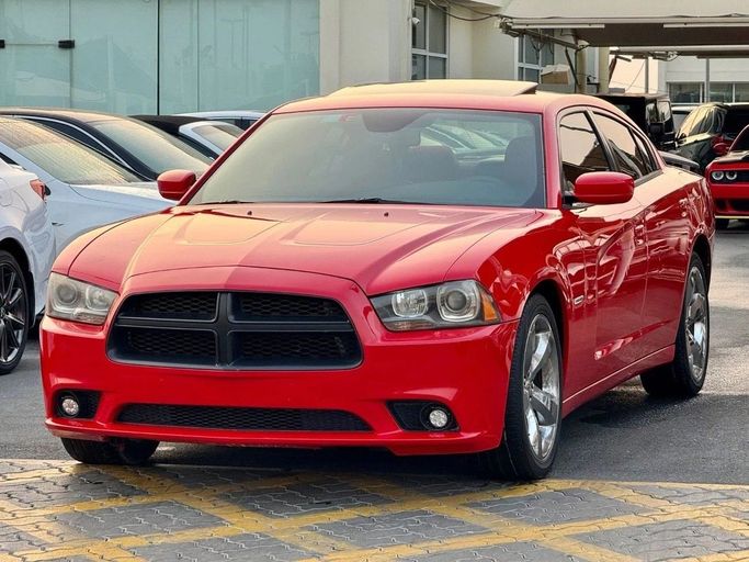 Подержанный Dodge Charger R_T VII (LD), 5.7 л, 2014 в Шардже от Titanium Used Cars Красный цвет. GCC | AUTO.AE