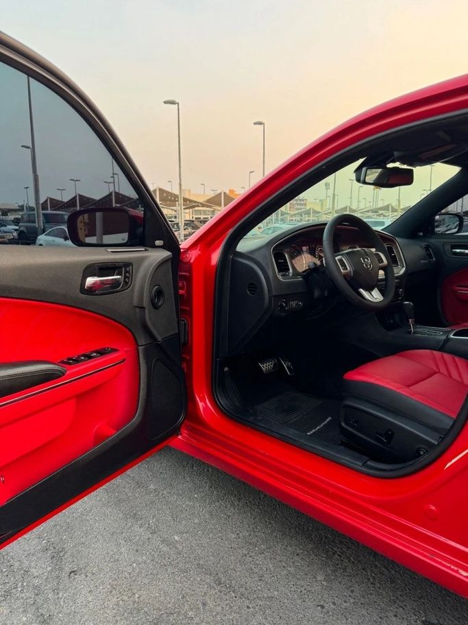 Подержанный Dodge Charger R_T VII (LD), 5.7 л, 2014 в Шардже от Titanium Used Cars Красный цвет. GCC | AUTO.AE