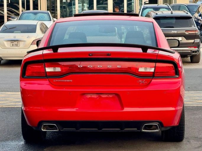 Подержанный Dodge Charger R_T VII (LD), 5.7 л, 2014 в Шардже от Titanium Used Cars Красный цвет. GCC | AUTO.AE