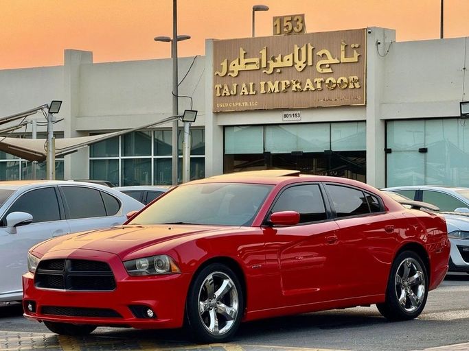 Подержанный Dodge Charger R_T VII (LD), 5.7 л, 2014 в Шардже от Titanium Used Cars Красный цвет. GCC | AUTO.AE