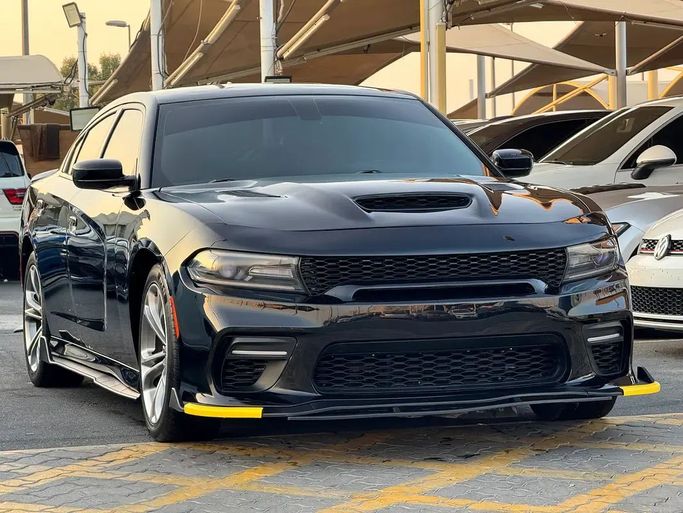 Подержанный Dodge Charger R_T VII (LD) Рестайлинг, 5.7 л, 2020 в Шардже от Taj Al Impratoor Used Cars Черный цвет. Американская | AUTO.AE