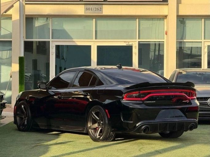 Used Dodge Charger Hellcat VII (LD) Facelift, 6.2 l, 2019 in Sharjah by Noor Al Seyoh Used Cars, Black color. GCC Specs | AUTO.AE