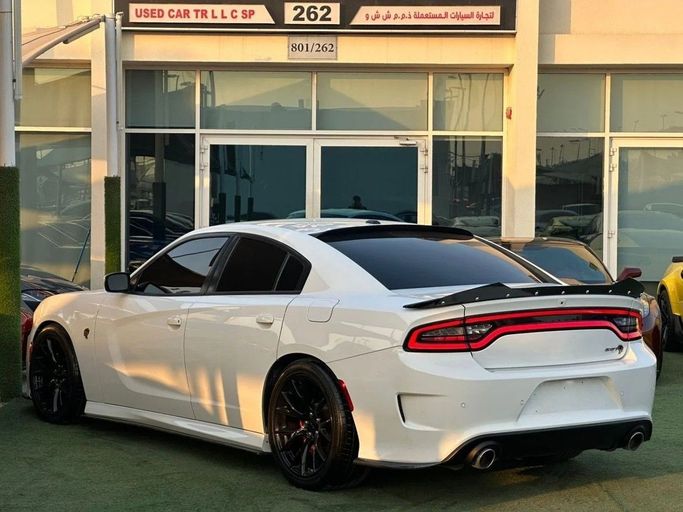 Подержанный Dodge Charger Hellcat VII (LD) Рестайлинг, 6.2 л, 2017 в Шардже от Noor Al Seyoh Used Cars Белый цвет. GCC | AUTO.AE