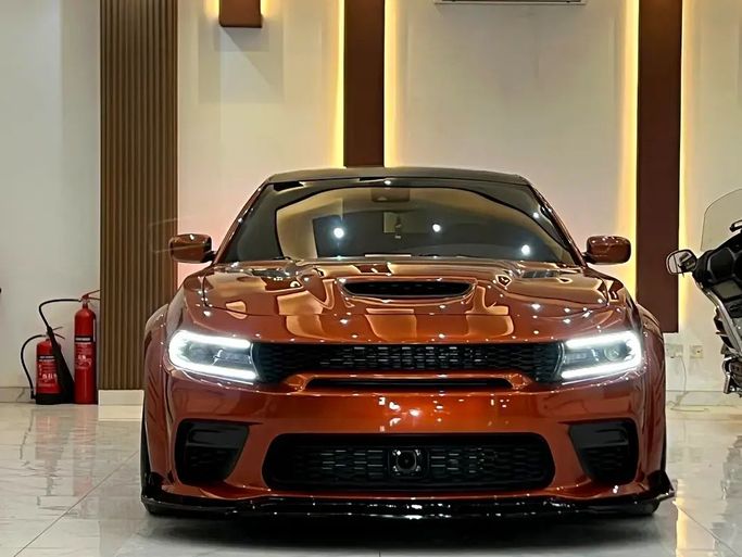 Used Dodge Charger SRT VII (LD) Facelift, 6.4 l, 2021 in Sharjah by Rebou Alfakhama, Orange color. American Specs | AUTO.AE