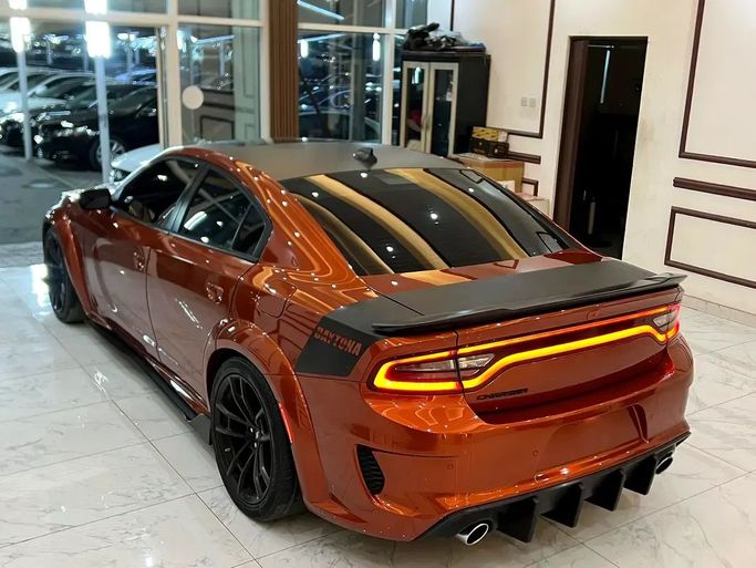 Used Dodge Charger SRT VII (LD) Facelift, 6.4 l, 2021 in Sharjah by Rebou Alfakhama, Orange color. American Specs | AUTO.AE