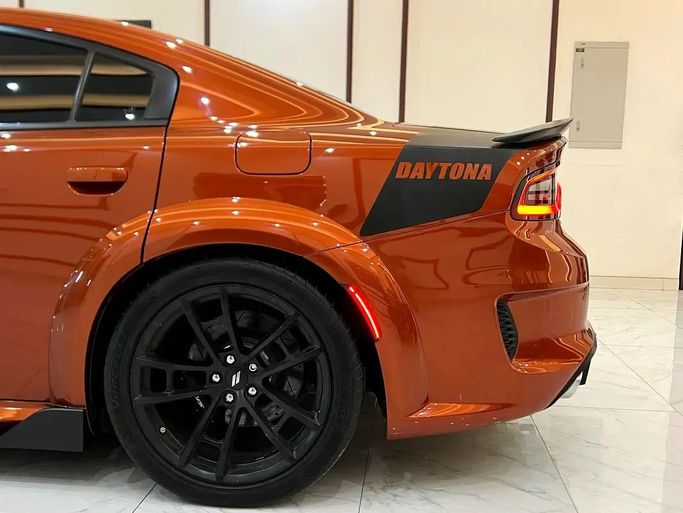 Used Dodge Charger SRT VII (LD) Facelift, 6.4 l, 2021 in Sharjah by Rebou Alfakhama, Orange color. American Specs | AUTO.AE