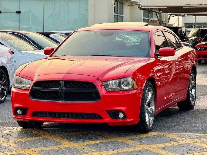 Used Dodge Charger R_T VII (LD), 5.7 l, 2014 in Sharjah by ASAL ALHAIBAH USED CARS, Red color. GCC Specs | AUTO.AE