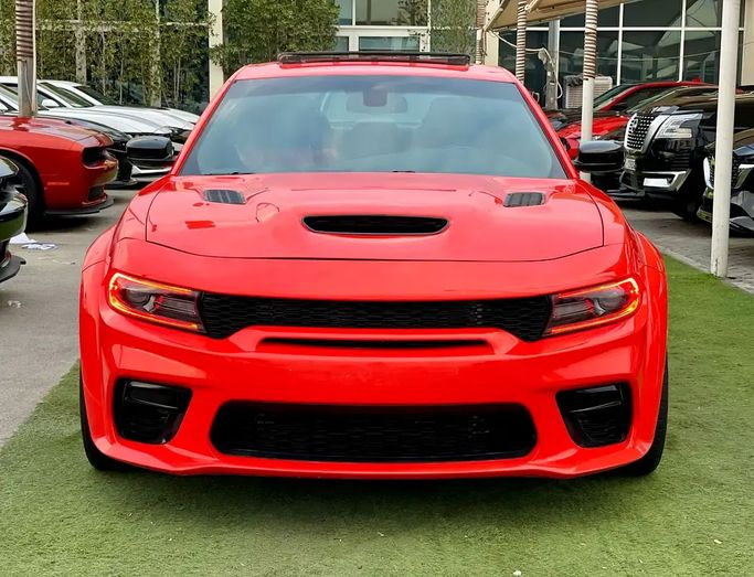 Подержанный Dodge Charger SRT VII (LD) Рестайлинг, 6.4 л, 2021 в Шардже от Walid Kahat Оранжевый цвет. Американская | AUTO.AE | Объявление #273041