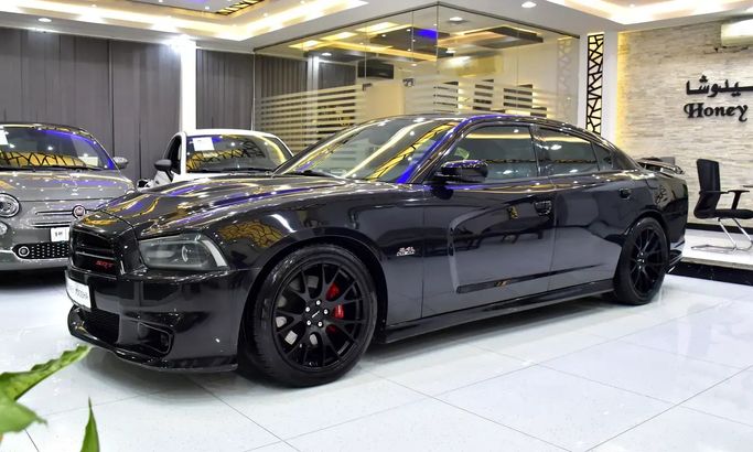مستعملة Dodge Charger SRT-8 سابعاً (LD), 6.4 l, 2013 في في الشارقة من Honey Jidosha Used Cars Tr.، اللون أسود. مواصفات الخليج | AUTO.AE | إعلان #273171