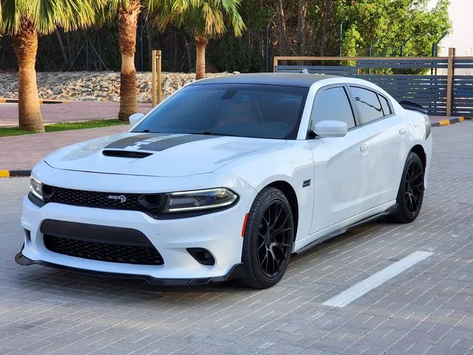 Used ⁦Dodge Charger R_T VII (LD) Facelift, 5.7 l, 2018⁩ in UAE, Sharjah by ASAL ALHAIBAH USED CARS, White color. American Specs | AUTO.AE | Listing #287365