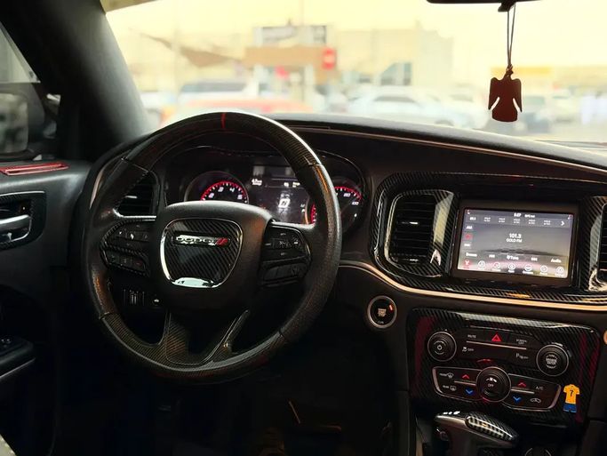 مستعملة Dodge Charger SXT عملية فيس ليفت السابع (LD)، 3.6 لتر، 2019 في الإمارات، الشارقة من Rebou Alfakhama، اللون برتقالي. المواصفات الأمريكية | AUTO.AE | إعلان #295835 — صورة 12 من 14