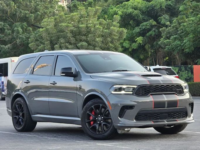 Подержанный Dodge Durango III Рестайлинг 2, 6.2 л, 2021 в Шардже от Al Jana Used Cars Серый цвет. Американская | AUTO.AE