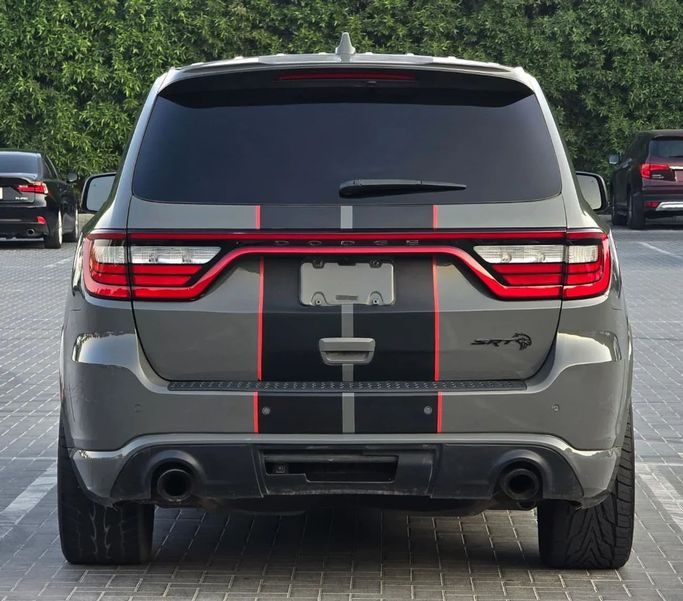 Подержанный Dodge Durango III Рестайлинг 2, 6.2 л, 2021 в Шардже от Al Jana Used Cars Серый цвет. Американская | AUTO.AE